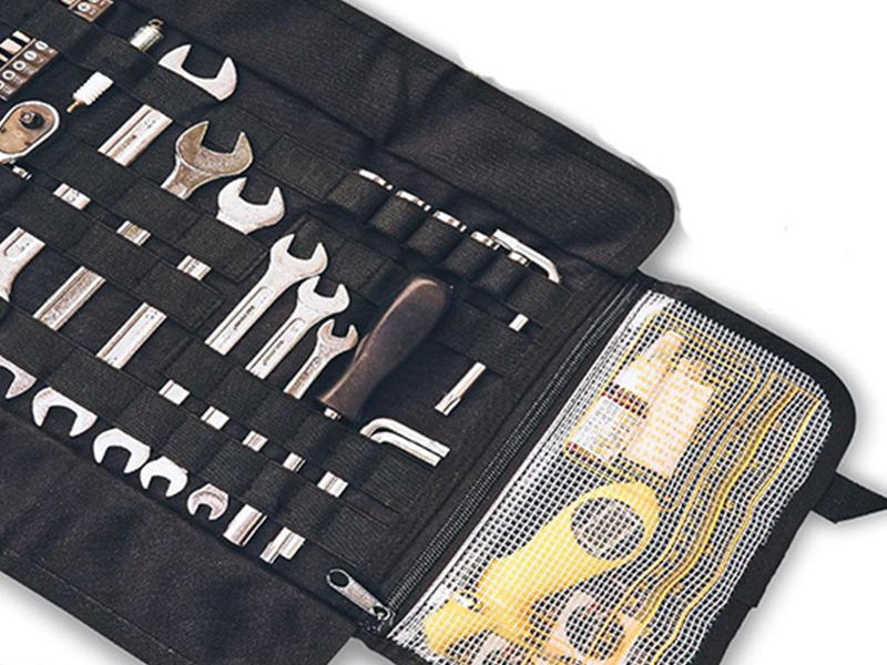 Separate Storage for Small Accessories on a motorcycle tool bag
