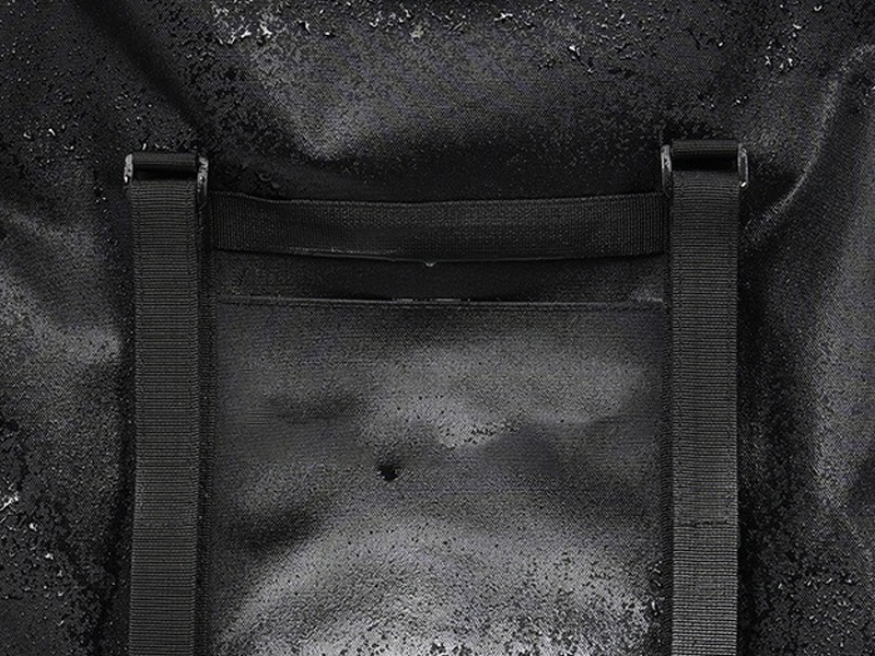 Water-Repellent Fabric Helps Shed Splashes on a bike travel bag